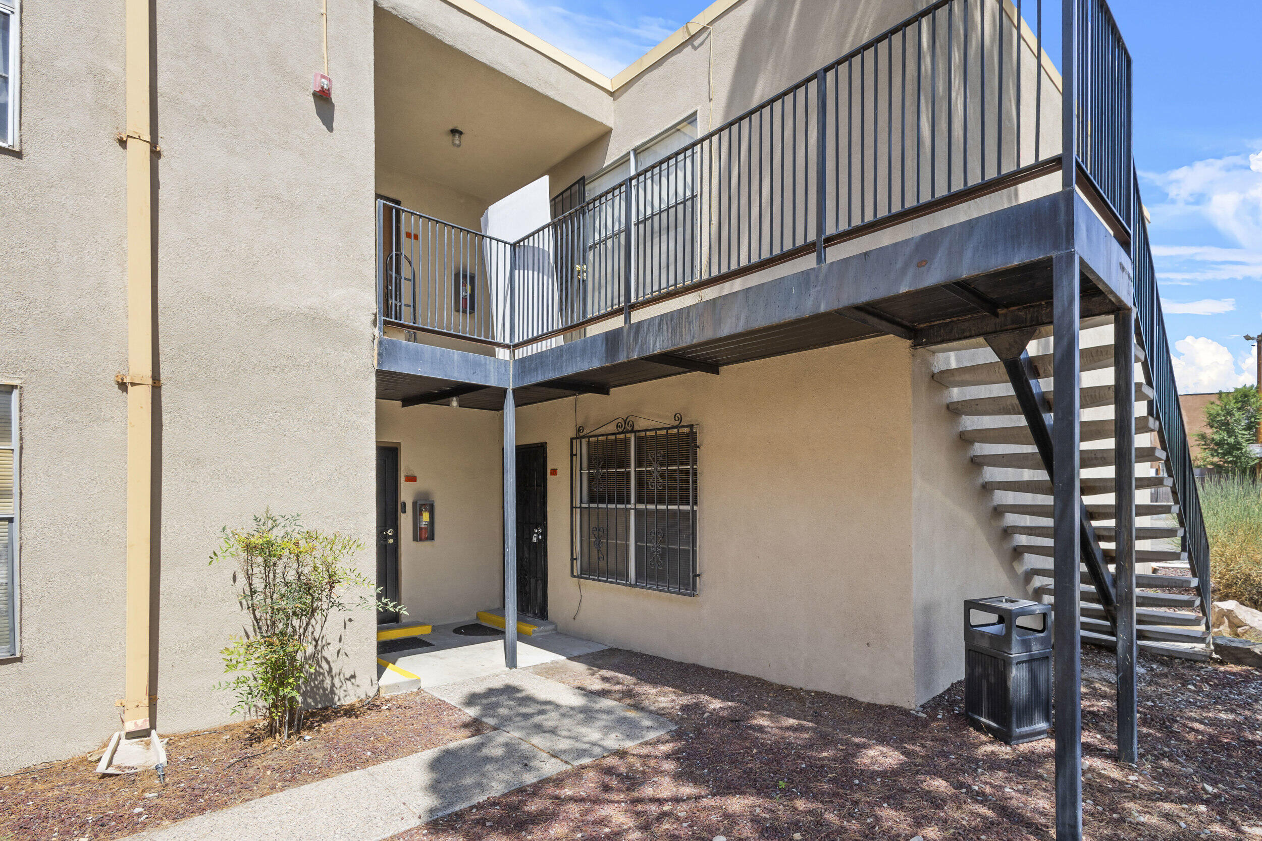 Welcome to a compact yet comfortable condo located in the heart of a vibrant community near UNM. The main living area is dominated by an earthy aesthetic with its rich brown laminated flooring and a room that is anchored by white walls that await your personal touch, inviting you to create an interior that reflects your style. The open floor plan seamlessly transitions into the kitchen, where practicality and simplicity mesh. This well-lit space is equipped with essential appliances.The space allows for creative furniture arrangement and is bathed in natural light from the well-appointed windows. Situated close to UNM, it promises a lifestyle of convenience, with easy access to local eateries, perfect for university students, small families, or professionals.