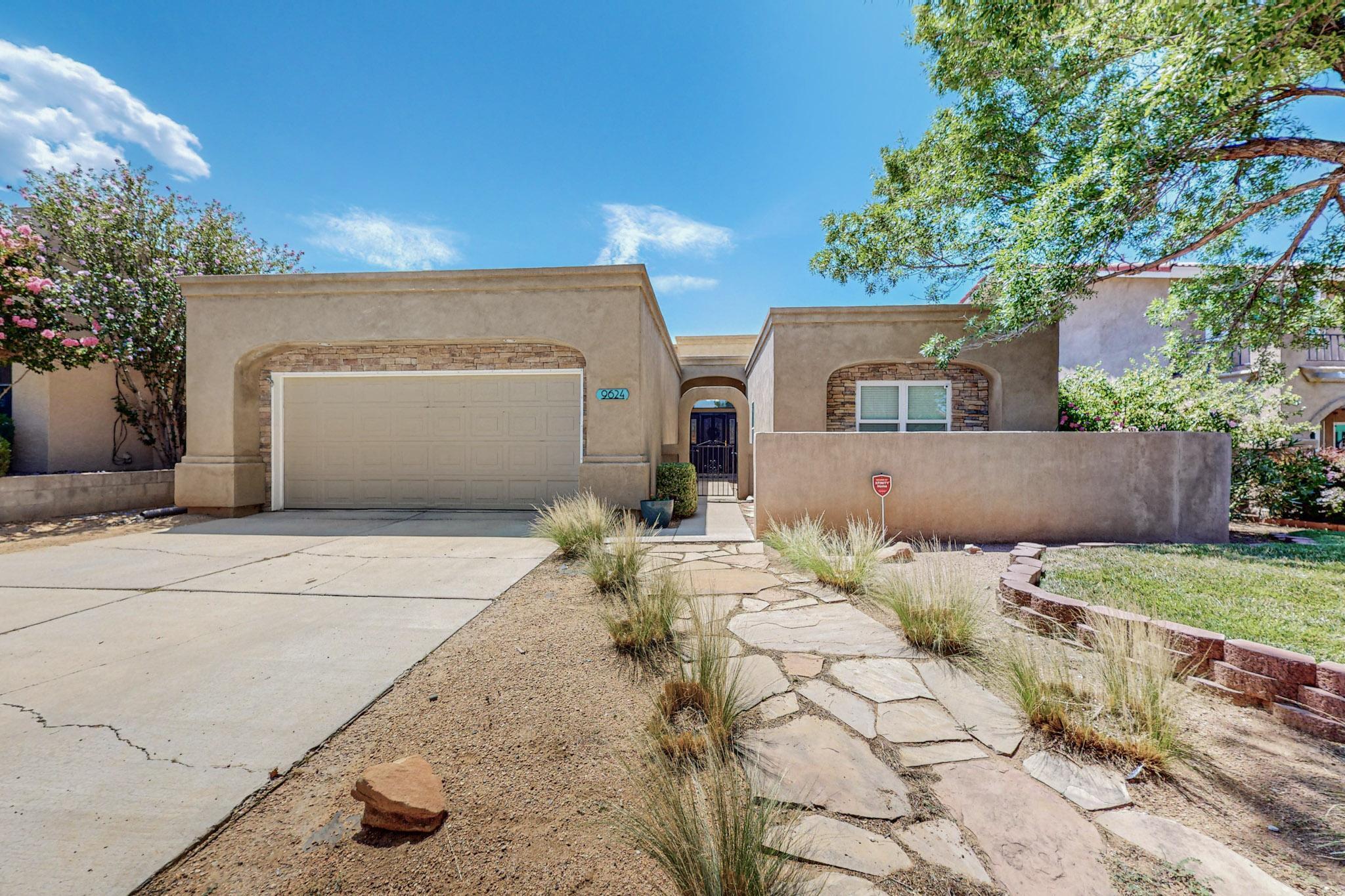 Welcome Home to this lovely 3 bed 2 bath in the desirable Heritage East! Open floorplan features an updated kitchen with quartz counters, stainless steel appliances and timeless backsplash flowing into the spacious family room w/ fireplace! You'll love the soaring ceilings and natural light in the main living room + sunroom leading to the private backyard with lawn and open patio area. Updated flooring in main living areas, new HVAC in 2023 (Refrigerated air!), TPO roof in 2021. Move-in Ready!