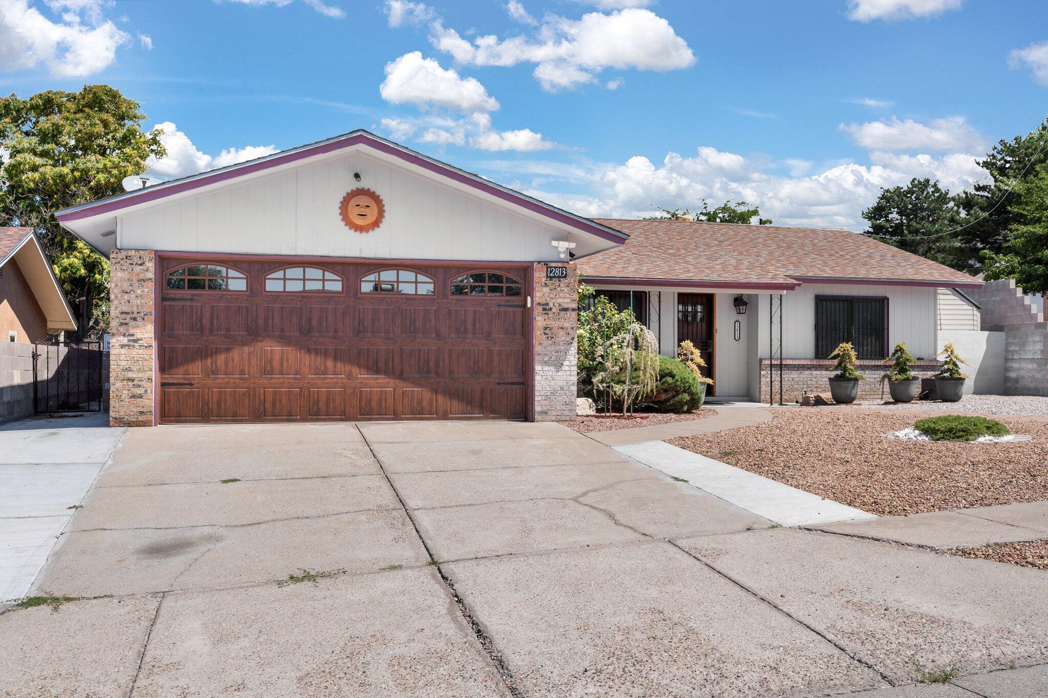 This charming foothills home is nestled on a corner lot in a desirable area close to dining and shopping and easy access to the interstate. The completely remodeled kitchen boasts newer self-closing cabinets, backsplash, granite countertops, and upgraded stainless steel appliances. Two living and dining areas, one with a fireplace makes this the the perfect retreat for all. The dining area opens to a light-filled backyard with a covered patio, perfect for summer gatherings. Upgraded features include newer hardwood floors, a custom garage door, a new front door, refrigerated air, a water heater, and a furnace (all 2020), full home water filtration system and two storage sheds.  This home truly has it all, schedule your showing today!