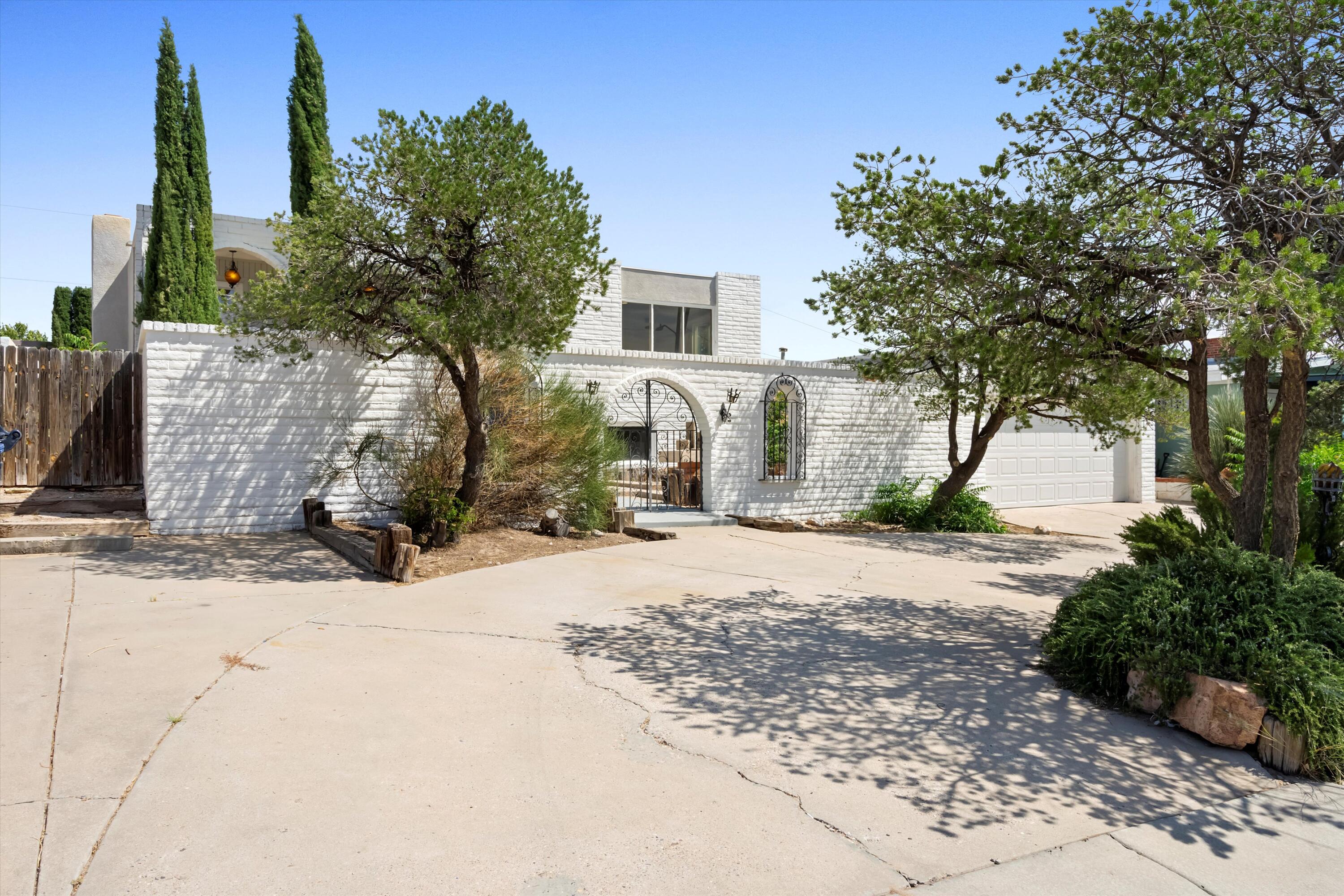 **OWNER FINANCING AVAILABLE** Welcome to 3731 Riverview Rd NW, a beautifully remodeled 4-bedroom, 3-bathroom home offering 2,418 sqft of spacious living. This charming property, situated on a 0.23-acre lot, boasts peekaboo city views from the balcony, a lush backyard with fruit trees, grape vines, and tranquil water features, plus a cozy front courtyard for added outdoor space. The home features an electric fireplaces in the living room, modern finishes, and a circular driveway for convenient parking. With ample space for family and friends, this home is perfect for those seeking a blend of comfort and style. Schedule your showing today!!