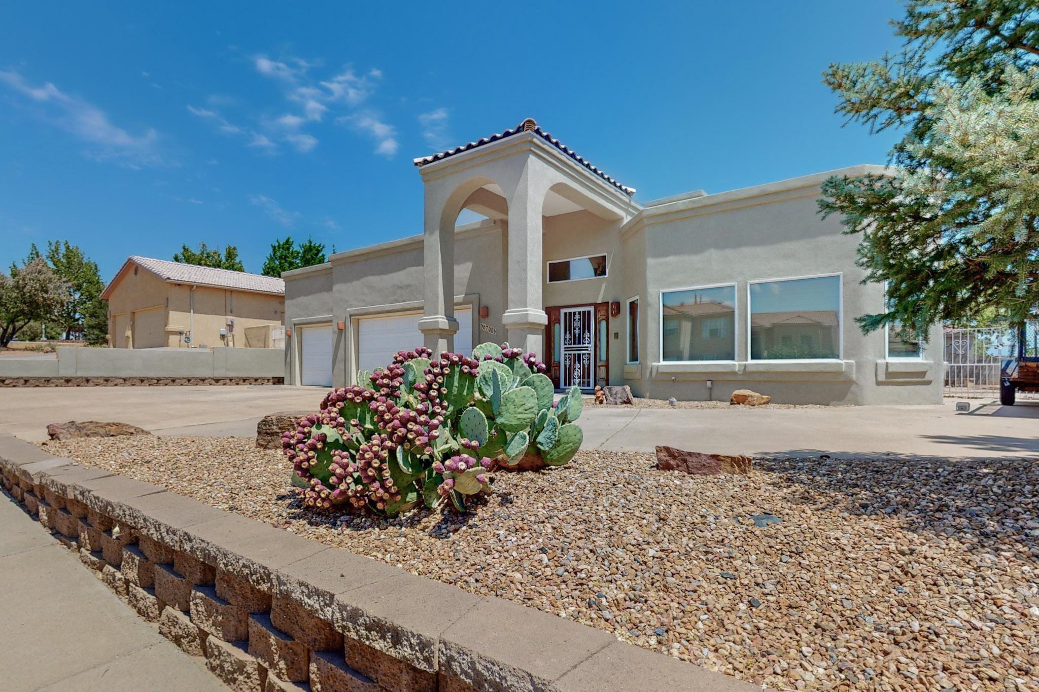 Experience luxury and convenience in this custom-built, two-story home on a desirable corner lot. The primary bedroom is situated upstairs for added privacy. This residence boasts three master-cooled zones and a dual heating system featuring radiant and baseboard heat. The interior is enhanced with stained concrete floors and a jetted tub, adding to the luxurious ambiance. A well-equipped kitchen features a double oven, cooktop, fridge, and microwave, all newer appliances. The spacious three-car garage offers ample storage, and the Tuff Shed is perfect for additional space. Enjoy the perks of a built-in wall vacuum and recirculating hot water. With backyard access, this home combines comfort and functionality in every detail.  Call today for your private showing.