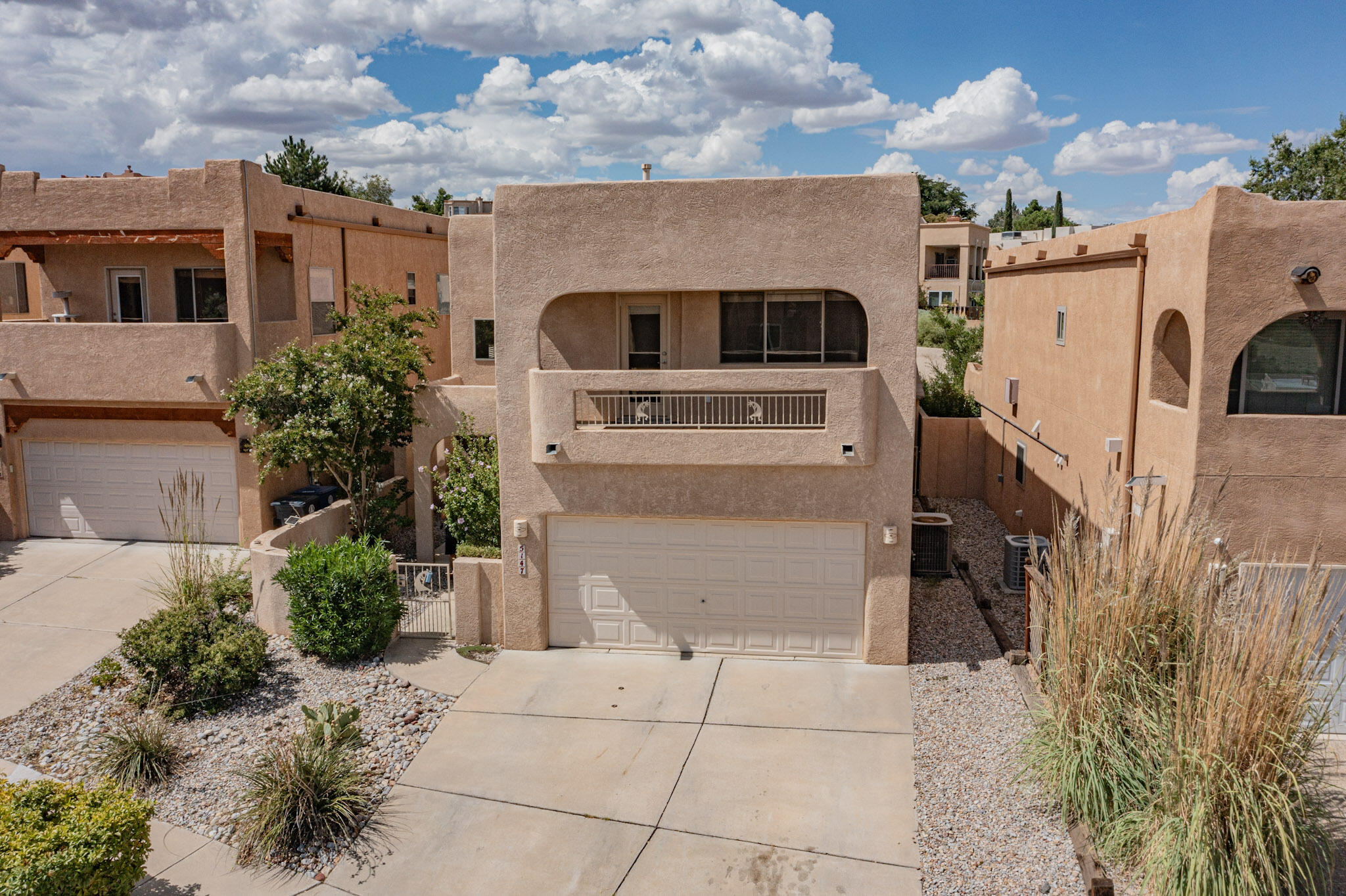 Your buyers will love the warmth of this contemporary home located within steps of the bosque. Enter and you are greeted by tons of natural light and an open floor plan. The living and dining spacious are both generously sized and are open to the chef's kitchen. The kitchen offers stainless steel appliances, new solid surface counter tops and backsplash. The counter tops are carried through the laundry area and make an efficient and attractive workstation. Upstairs you will find an oversized primary suite with fully updated bath, view deck and elegant two-way fireplace. Take in views of the Rio Grande, bosque Sandia mountains and downtown Albuquerque from the view decks on the east side of the home. The backyard has been recently updated with a covered patio- ideal for entertaining.