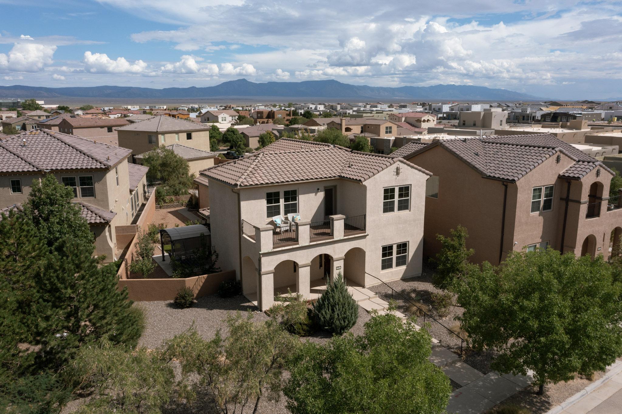 Be in this beautiful Otono floor plan from Pulte by the first days of Autumn! Competently maintained by experienced home owners in Albuquerque's growing Mesa del Sol community, we are proud to present this fantastic opportunity! Enter and instantly feel at home in the wide open first floor, easily configured to fit a broad variety of lifestyles. Enjoy a tastefully designed kitchen with large island, a beautiful appliance suite and tons of workspace! Exit to the backyard through double sliding doors and enjoy a perfect Fall evening under the pergola! Upstairs, find three bedrooms, a perfect balcony for sunset views, and a Primary Suite with large bathroom and large, cheerful closet with a view of the mountain! This home also has a 3 car (tandem) garage! Everything you need is here!