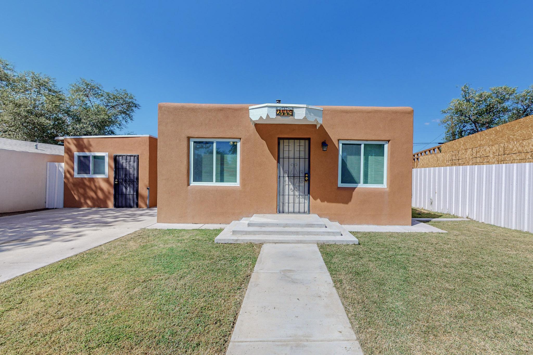 You can own this move-in ready home for less than 10k down payment or as little as zero down. This home has been updated with new flooring, and an updated kitchen that includes new quartz countertops, a new sink, and new cabinets. The addition of new baseboards, toilets, and windows have truly elevated this home and made it stand out from the rest. One of the unique features of this property is the studio space, which can be utilized as a home-based business or as a separate living quarters. With heating and a new 3/4 bathroom, this versatile space offers endless possibilities. The property is fully fenced for privacy, fully landscaped, boasts a beautiful lush lawn, and features a covered patio that is perfect for entertaining guests or enjoying the New Mexico weather. Additionally,