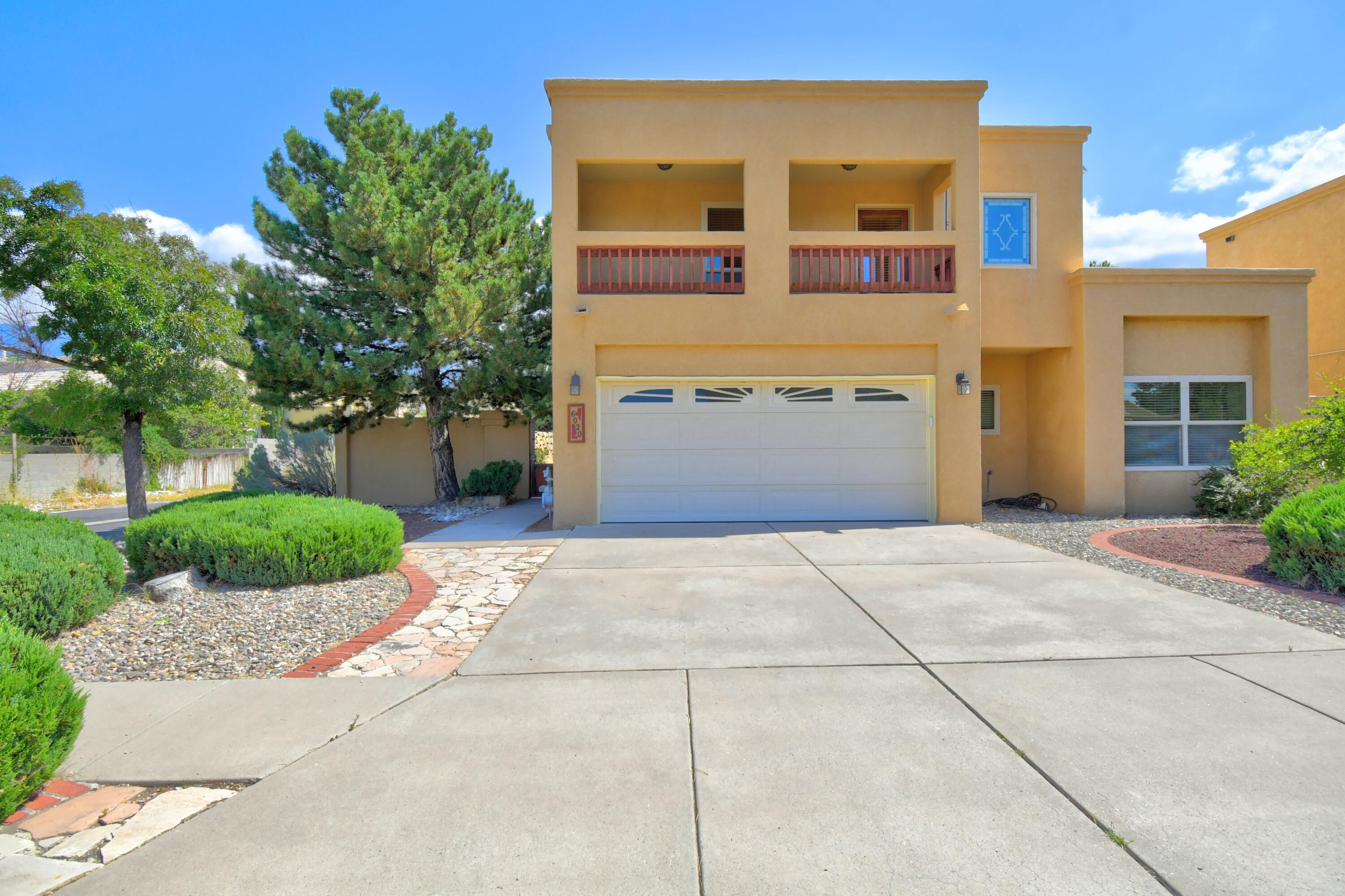 It's ready, it's clean, it's private, it's wonderful! Located at the end of a cul de sac. Private front courtyard with kiva fireplace, flagstone patio, with mountain views, water feature and beautiful gate entry.  Large living room just off the front door invites you and guests to feel at home.  Dining room with great chandelier is adjacent to living room,.  Kitchen is large with eat in area and large window and new countertops in 2016. The house is full of light from tons of windows. The cozy loft is a perfect quiet office space. Balcony off  primary bedroom gives great views of downtown and balloon fiesta. 4.8 KW solar power array on roof owned by sell.by Positive Solar level EV charger  in garage. New TPO roof, and evap air 2020.