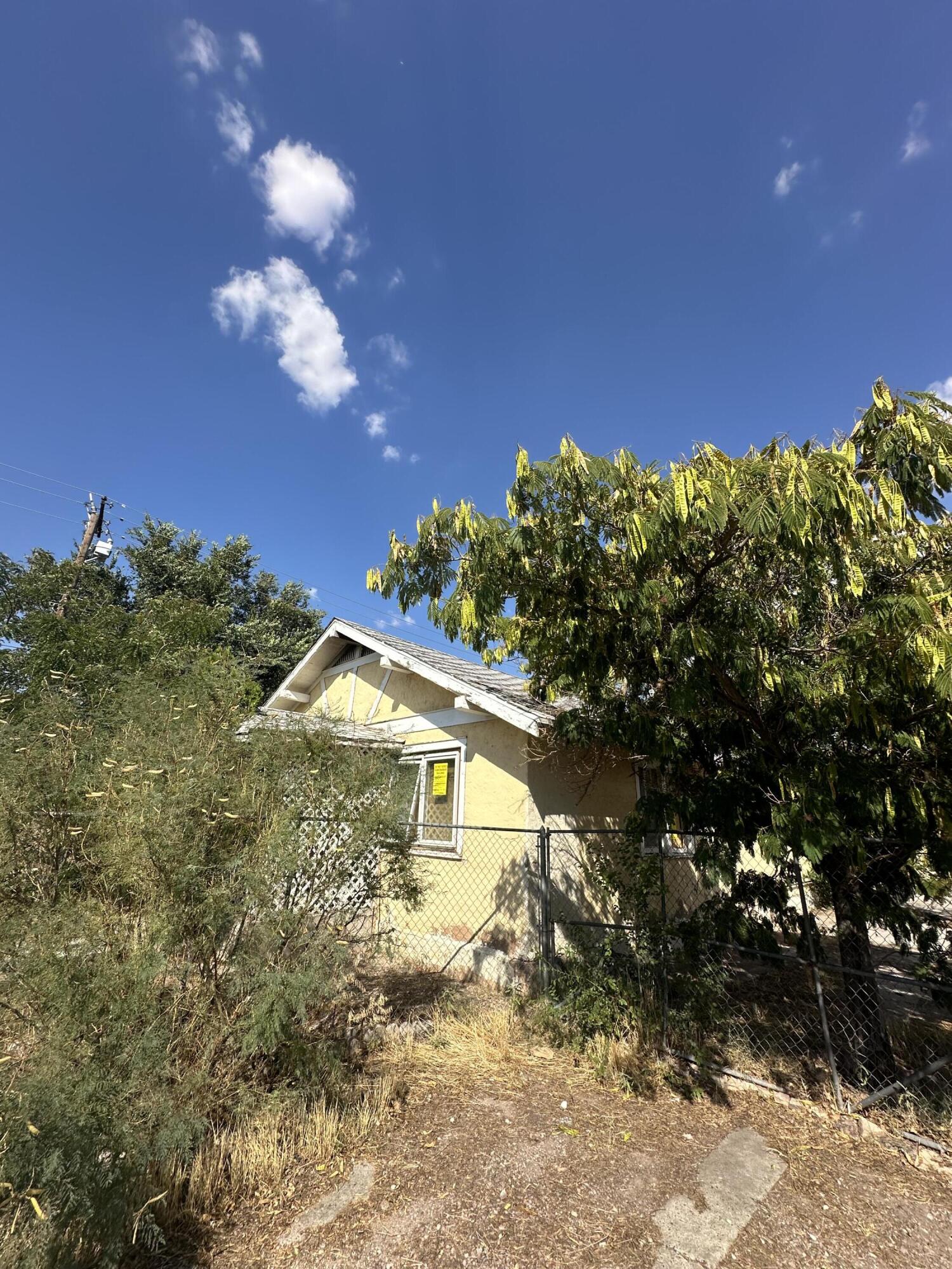 Downtown property in need of major rehab. Blocks from downtown Albuquerque, close to Central. TLC, investor special, handyman special. Utilities are not on, sub standard home.