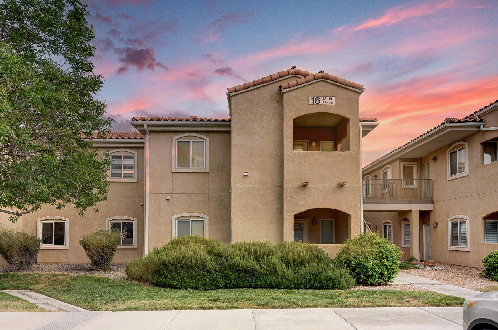 Beautiful upstairs condo with nice balcony. All appliances including washer and dryer convey. Refrigerated air. Detached one car garage with opener. Reserved, numbered parking space and private garage included in this secure gated community. Two pools, a fitness center and clubhouse included in the HOA. Close proximity to the Balloon Fiesta Park and walking/running trails. HOA dues also cover water and trash.