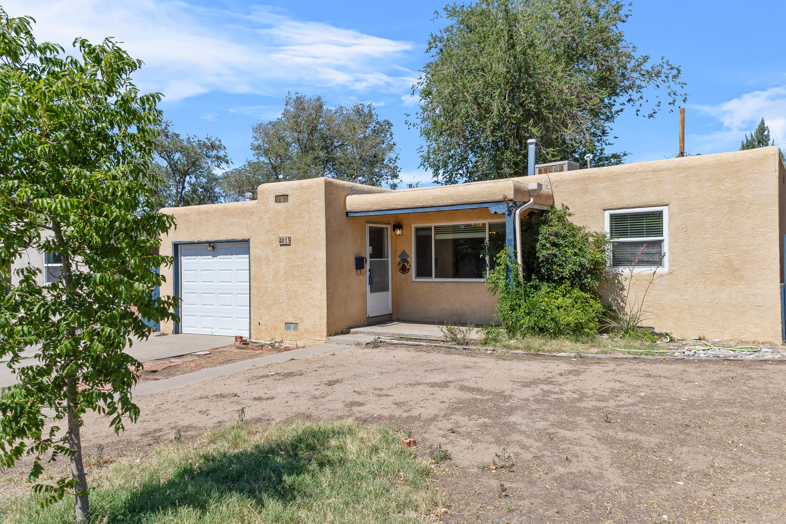 Nestled in the desirable Ridgecrest Addition, this lovely home is priced at $308,000. Featuring 2 bedrooms and 1 bathroom, this vintage property exudes charm with hardwood floors throughout and a bright, open floor plan. Enjoy the spacious backyard and ample front driveway. Conveniently situated near UNM, this home is surrounded by a wonderful neighborhood with fantastic neighbors.