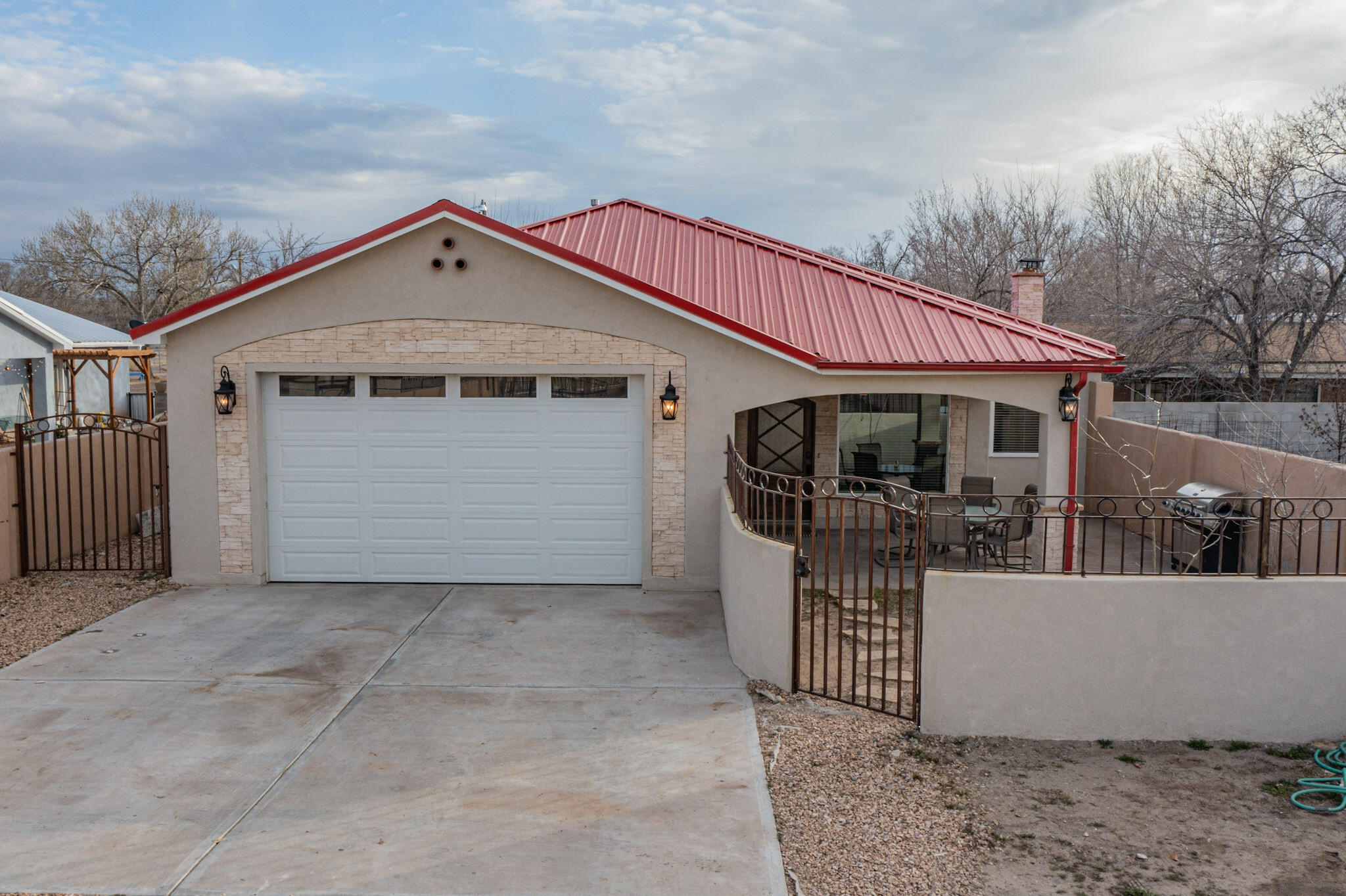 Bring your buyers to this Gem located by Rio Grande High School. Sitting on 1/3 of an acre, there is ample room for your extra vehicles and trailers.. The property is completely fenced with an automatic gate. Built in 2019, the home reflects the pride of ownership. Enter through the custom front door and take in the open concept floor plan. stunning tile floors and stack stone fireplace. The kitchen with its stainless steel appliances, beautiful cabinetry and granite counter tops will please the cook in the family. There is a spacious primary bedroom and beautiful primary bathroom for the owners to retreat to. The three other bedrooms spacious as well. A built in wet bar in the gameroom/den is great for entertaining. Out back is ample storage for the new buyers