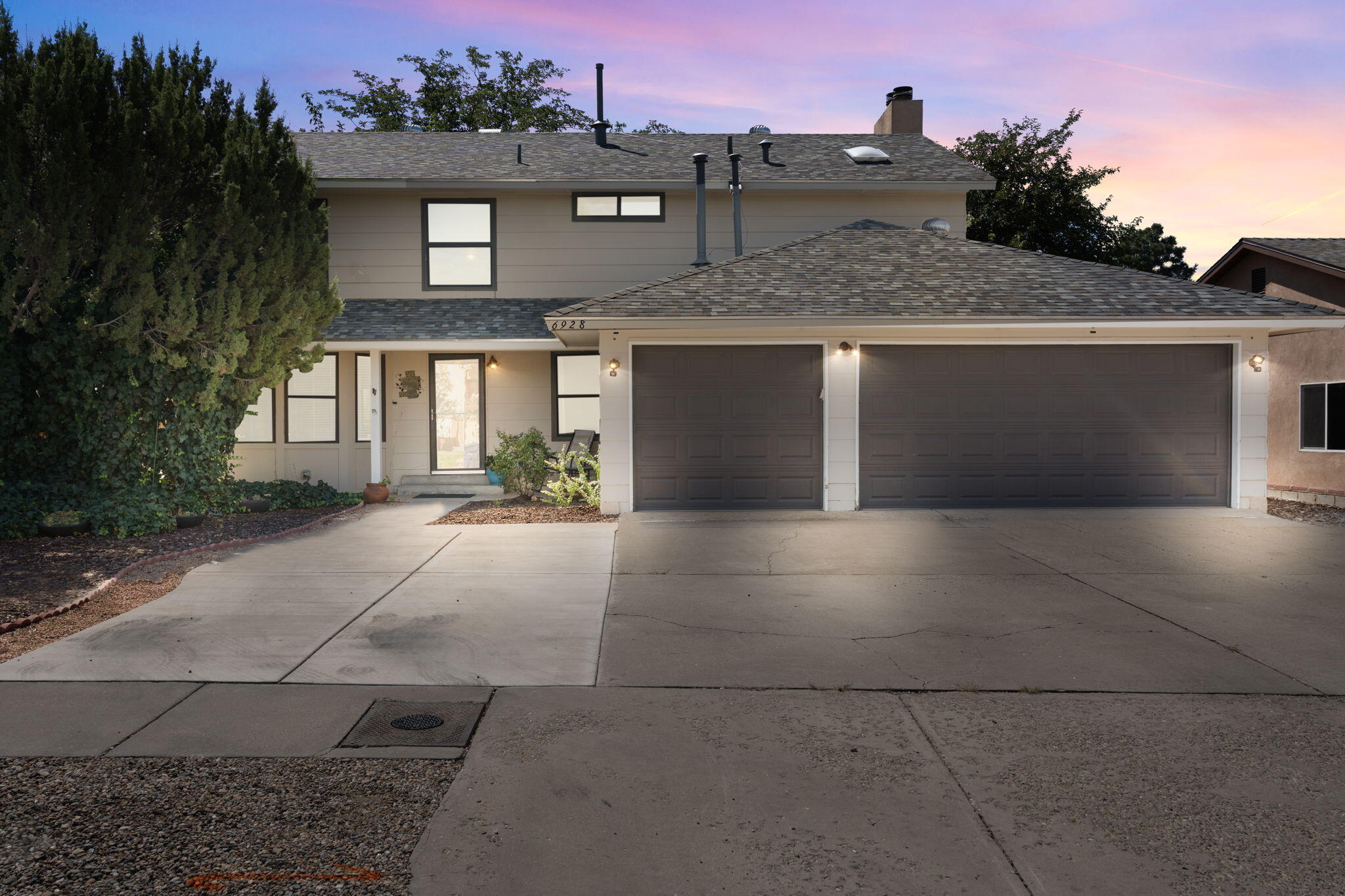 This inviting home seamlessly blends comfort and functionality. With three garage spaces and two living areas, one featuring a fireplace and a built-in credenza, it's perfect for both relaxation and entertainment. The kitchen includes a center island, and all essential appliances, complemented by a pantry for extra storage. Inside, you'll find a mix of carpet and tile flooring, radiant heat, ceiling fans, an alarm system, and a dedicated laundry space. The master suite is a private retreat with a balcony, an ensuite bathroom with a skylight, double sinks, a walk-in shower, and a spacious walk-in closet. The walled backyard is designed for effortless enjoyment with artificial grass, a cozy fire pit, and a built-in grill. Don't miss this opportunity--make this wonderful home yours today!