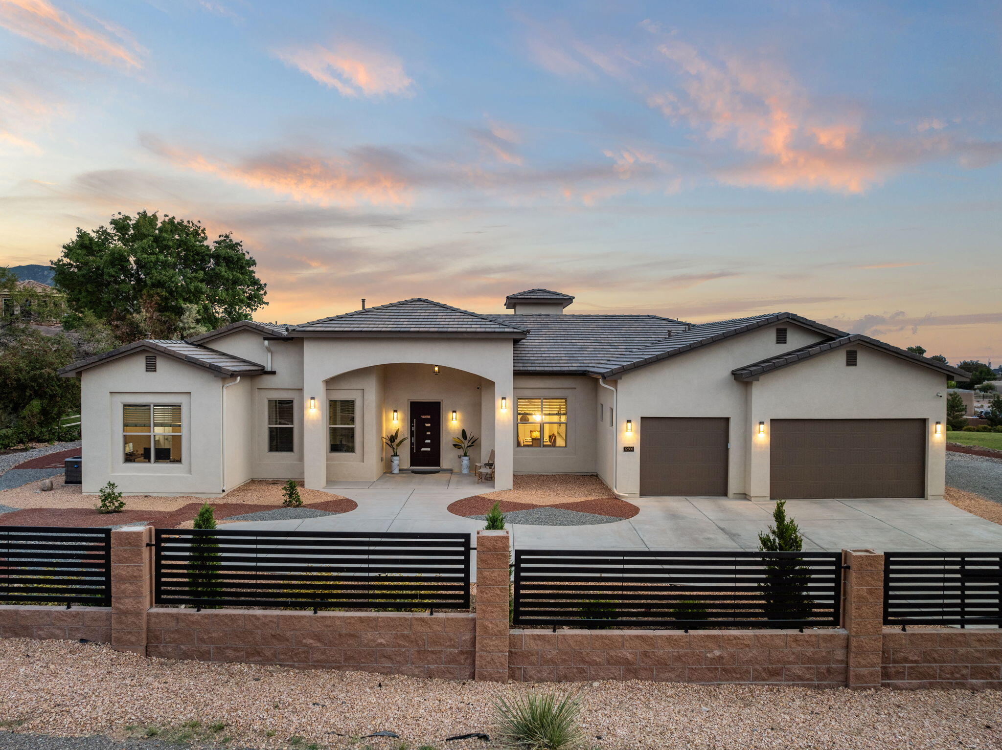 Upon stepping through the custom-crafted security gate, you enter an extraordinary home built by Prestige Custom Designs. This contemporary marvel envelops you in its unique charm and superior craftsmanship. Laser-leveled porcelain floors stretch before you, complemented by soaring 16-foot ceilings. The gourmet kitchen boasts KraftMaid cabinetry, while impeccable landscaping surrounds the property. Here, new memories are waiting to be made in this exceptional residence. Please use showing time, seller will open gate remotely at the approved time. Please keep exterior doors closed, there is a pet cat in the home. Please note all of the furniture is for sale.