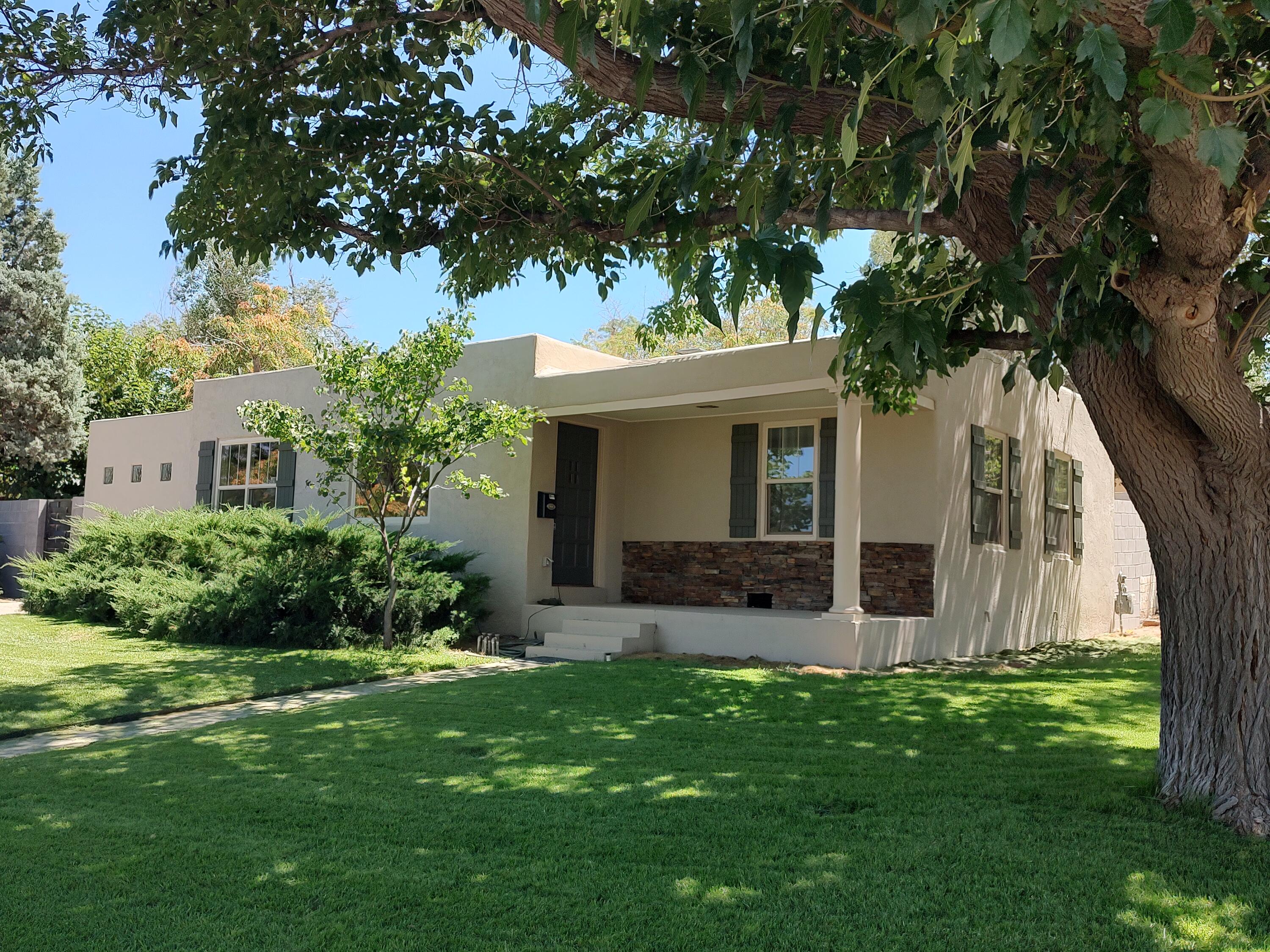 So many updates on this newly renovated UNM area home just down the street from Bandelier Elementary and 2 blocks from Hyder park. 5 mini splits provide heating and cooling, The renovated kitchen boasts new cabinetry, brand new garbage disposal and appliances! New vinyl thermal pane windows, updated electrical and plumbing throughout, Recent TPO roof. All new interior and exterior paint and updated bathrooms. Attention to detail preserving the vintage feel with 21st Century amenities! Possible office in 3rd BR with separate entry. Come see me, you will want to move right in!