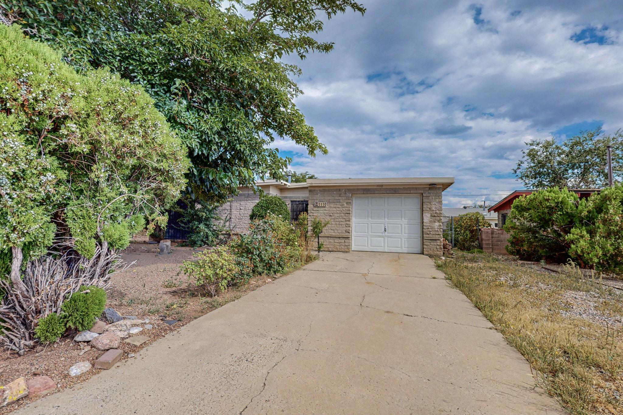 This wonderful 4 bedroom familly home has tongue and groove ceilings, wood beams in the home.  There is a spacious sun room that looks out into the lovely backyard.  The home has updated vinyl flooring.  This one will not last long reach out for showing.