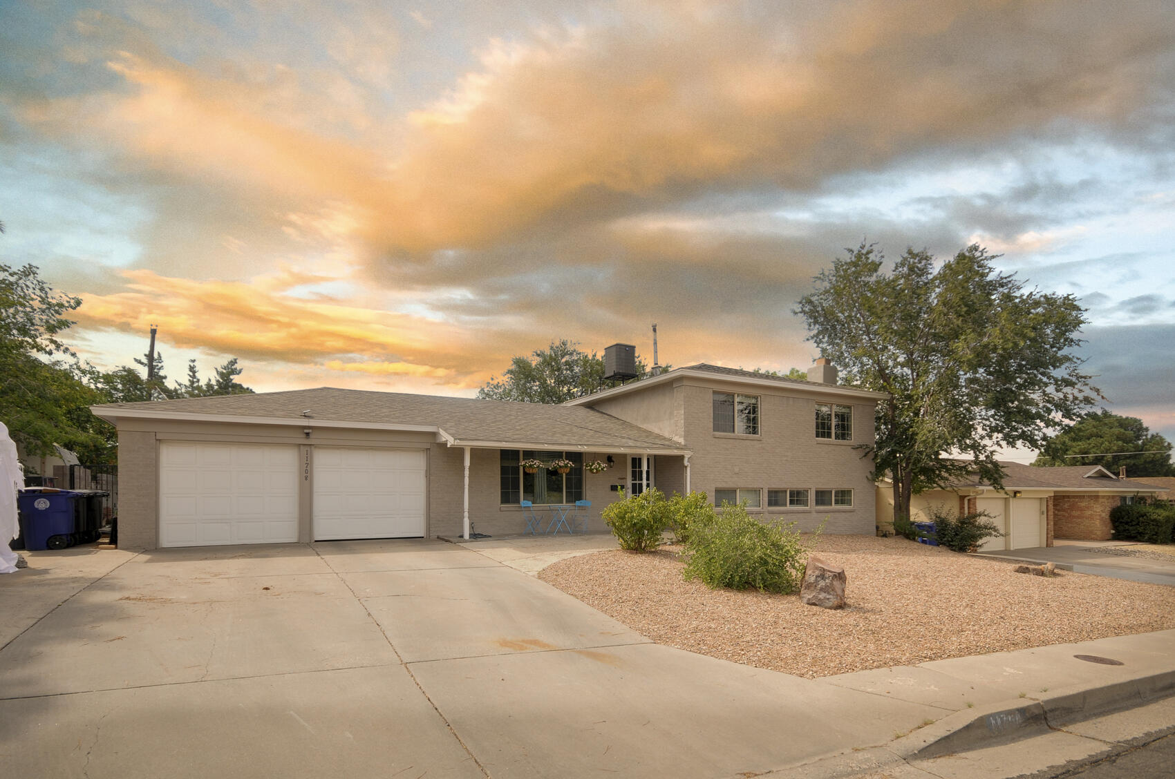 Beautifully remodeled 5-generation home, located in Holiday Park, blends modern comfort with thoughtful design. In 2022 updates included new flooring throughout, sleek kitchen cabinets, elegant quartz countertops and stylish slip trowel wall texture. Bathrooms were full revamped with contemporary fixtures. Mechanical systems also upgraded, featuring refrigerated air, new water heater, furnace, mini split and fresh shingles on the roof. 2024 improvements included advanced irrigation system and sod creating a serene outdoor retreat. Top of the line kitchen appliances indulging new stove and dishwasher, convenient pull out drawers and updated hardware. This home offers a perfect blend of modern amenities and stylish living spaces!