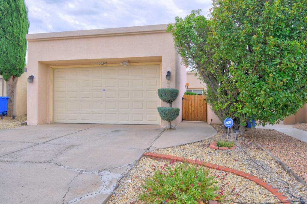 Sundrenched & Open Single Story Patio Home just 1 block from Bear Canyon Senior Center and 2 parks. Three Bedrooms with Primary separated from other two. Updated Kitchen and Bathrooms. Kitchen has solid surface counters, updated cabinets, 5 burner gas range, bay eating area. Raised ceiling great room with wood burning fireplace. TV stays! Tile of foyer and kitchen under great room carpet. Laminate flooring in bedrooms. Replacement windows and doors. Lots of skylights for wonderful natural light.  Ceiling Fans. Courtyard Entry. Both side and rear patios. Fabulous Southwestern Rustic wood post and beam  patio cover in rear. Generous 2 car garage with shelving, work and storage areas. Recent TPO Roof (5/22). Convenient to most everything. Secure and Easy living. Very Special. A Must See