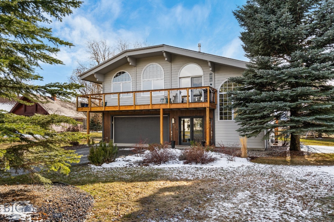 Enjoy mountain views and plenty of natural light in this modern chalet-styled home in Riverside Manor subdivision. Not many Bozeman neighborhoods have this lush and rural setting while still being minutes to downtown Bozeman, N. 19th shops and restaurants, and some of Bozeman's most popular hiking trails. The home's interior features 3 bedrooms, 2.5 baths, a large office or exercise room, laundry hookups on each level, and a great room for entertaining. The kitchen is recently updated with solid surface countertops, stainless steel appliances, and handy pull-out drawers. The center of the great room features a floor-to-ceiling gas fireplace for warmth and beauty. Bask on the huge wrap-around and deep second-level deck to enjoy the outdoors on all sides of this home. The spacious lot is located east of the driving range of Riverside Golf Course. Love to Nordic ski? No need to get in the car -- there are groomed trails throughout the neighborhood. The oversized, two-car entry garage is extra deep for storage of a drift boat, raft, motorcycle, or other Montana outdoor pursuits. An invisible fence is in place.