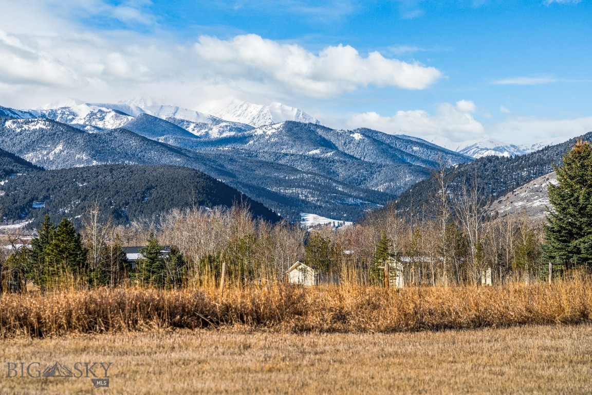 Own a scenic, level and beautiful piece of Gallatin Valley on the corridor from Bozeman to Big Sky. Located off of Highway 191, this 10-acre parcel is central to Big Sky, Bozeman and the rest of Gallatin Valley. You'll be a stone's throw away from fishing on the Gallatin River and trails in the Hyalite and Spanish Peaks Mountain Ranges. Light covenants to create the dream home of your liking.