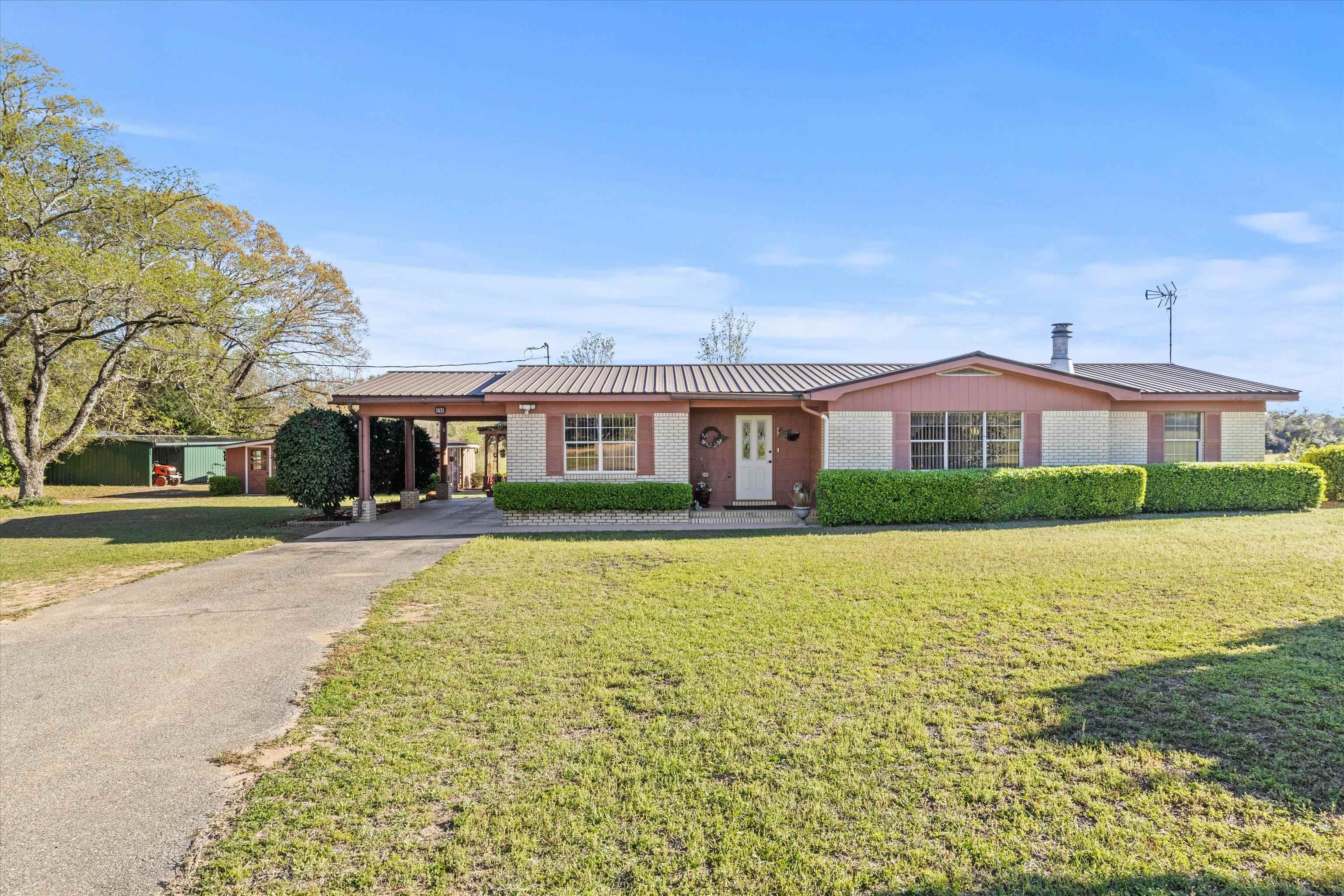 1671 Sand Basin Road, Grand Ridge, Florida image 1