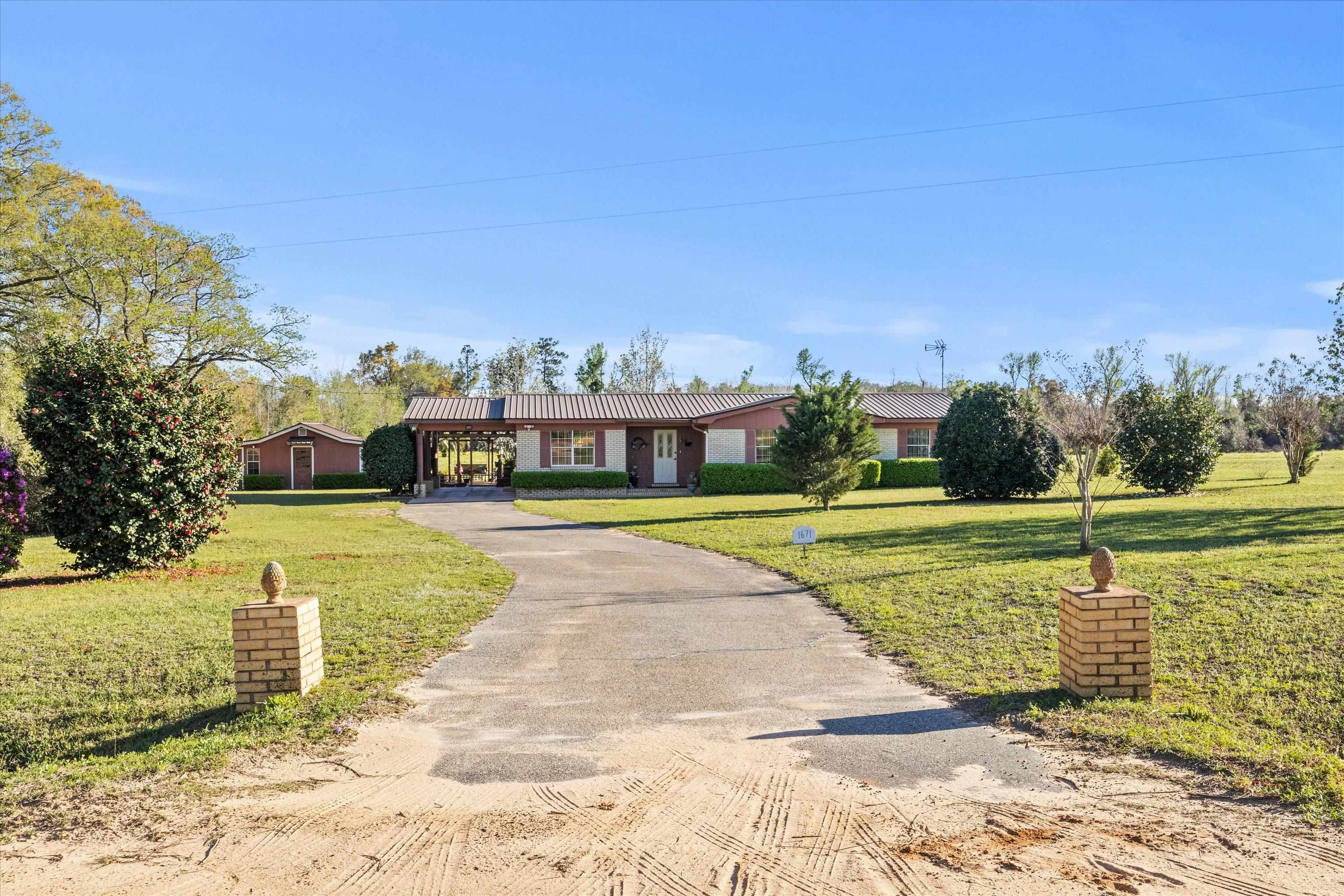 1671 Sand Basin Road, Grand Ridge, Florida image 2